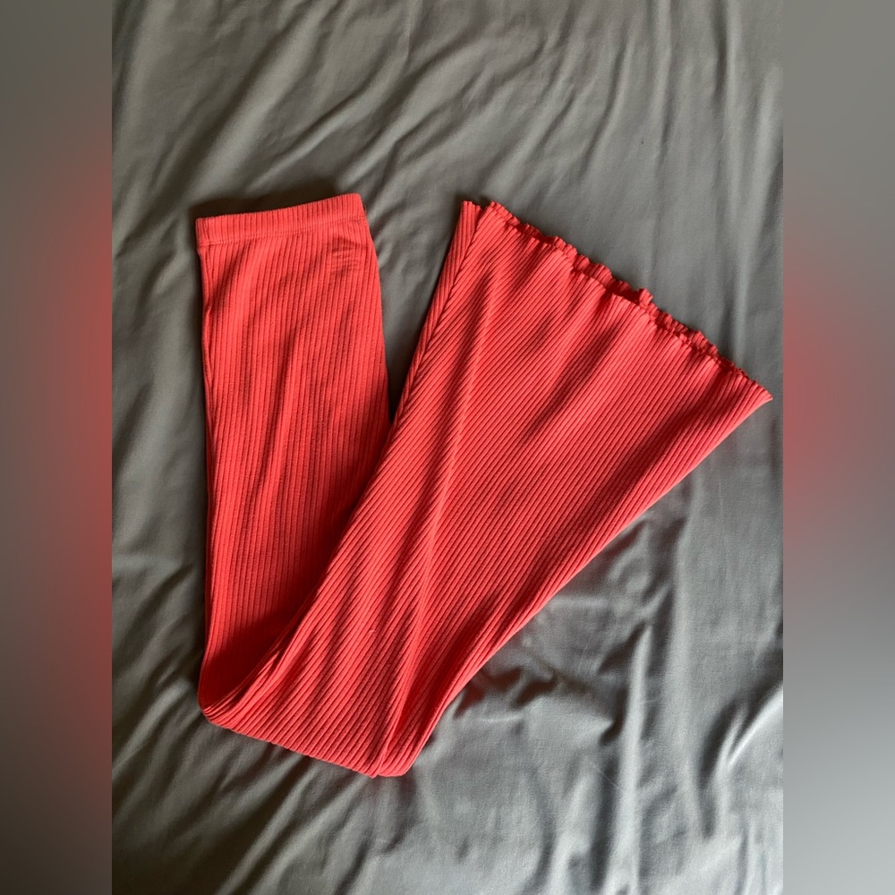 Aerie’s orange flare pants in women’s size XS